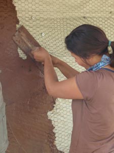 Troweling stucco work.